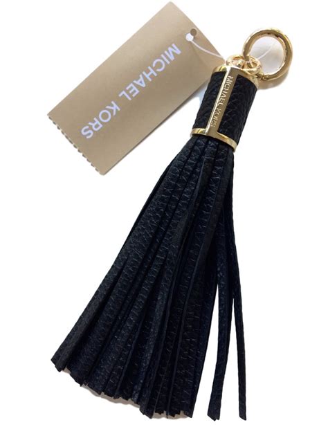 how do you attach michael kors tassel to purse|Does anyone use the key clip thing insid.